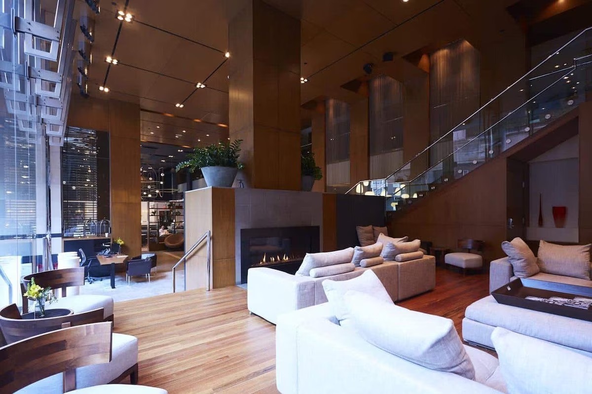 Le Germain Hotel Toronto lobby lounge with fireplace